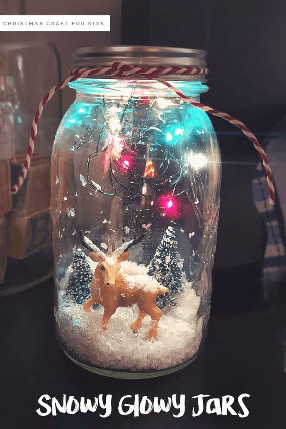 Mason Jar Christmas Centerpiece snow globe style with deer and Christmas trees