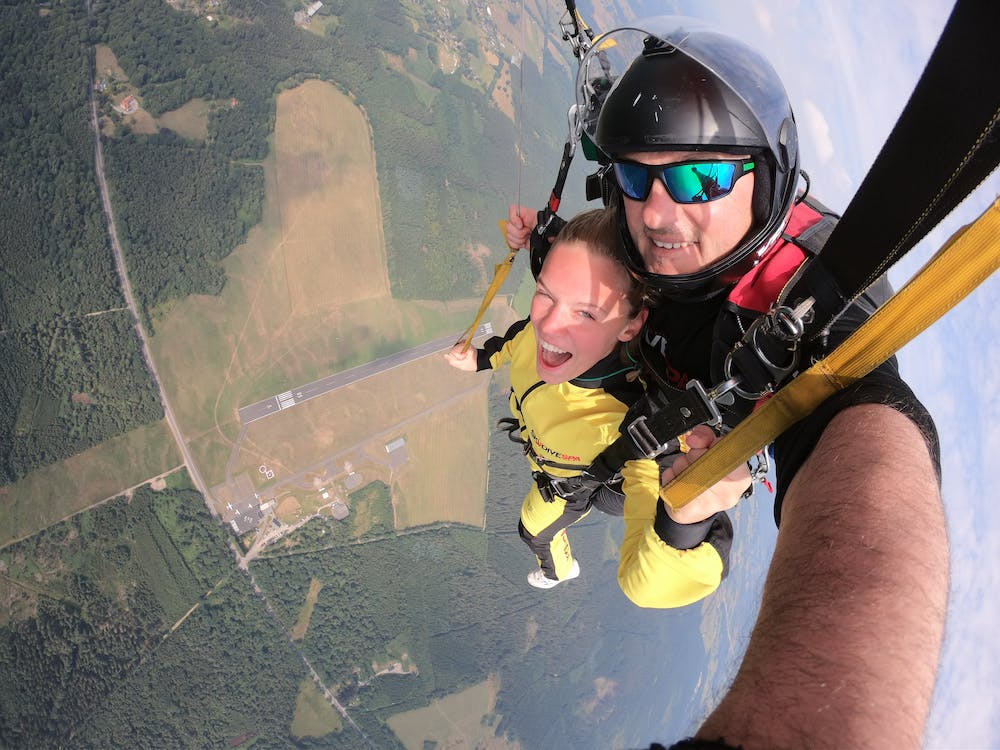 Couple skydiving as a Christmas gift idea for a couple that has everything.
