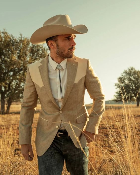 Cowboy Christmas Party ideas for men outfit, western suit with patches and bolo tie.
