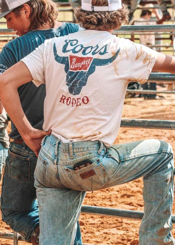 Cowboy Christmas Party ideas for men outfit. Jeans and RODEO GRAPHIC TEE.