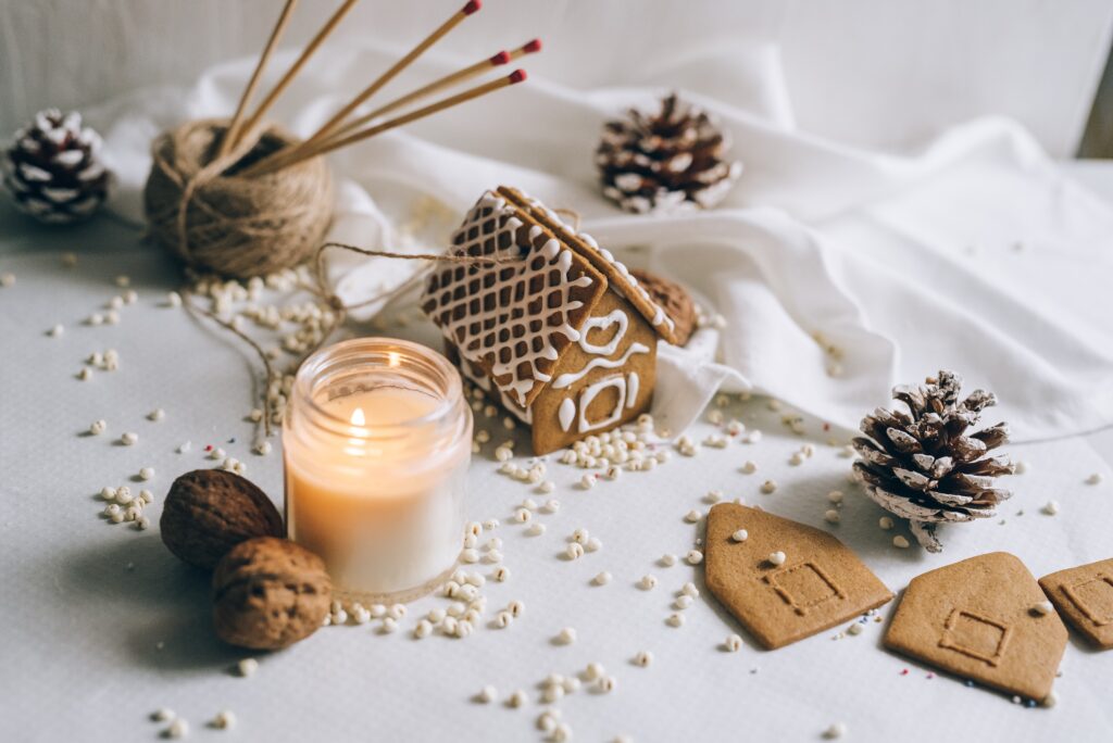 Christmas mason Jar Centerpieces with gingerbread house and candlelit