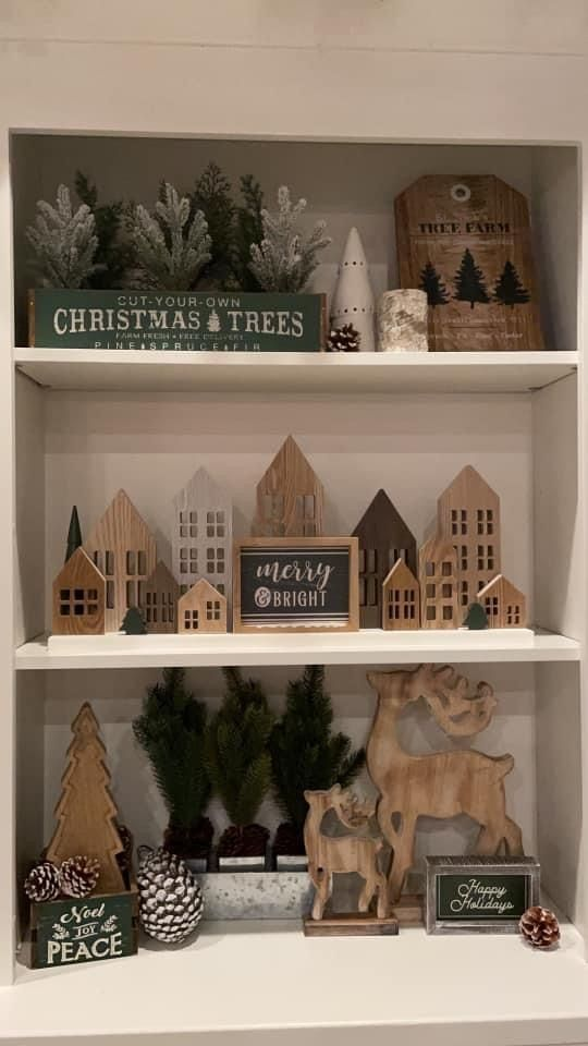  Rustic Christmas shelf decor ideas with wooden deer, trees and houses