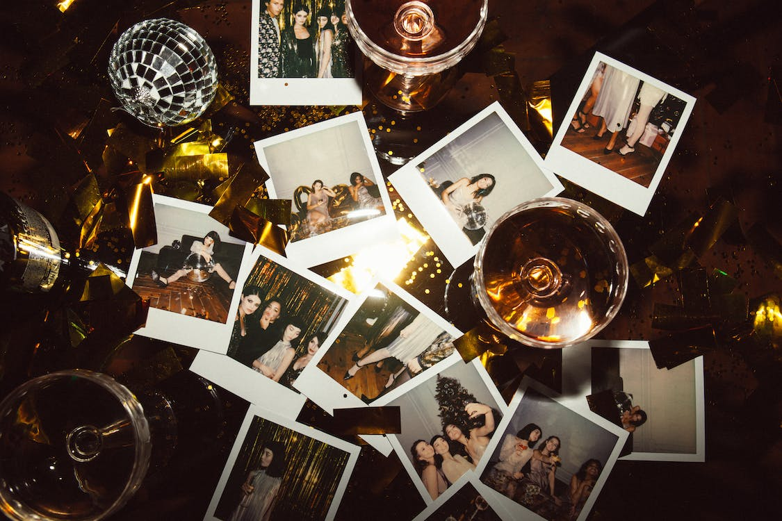Family New Year's Eve ideas, taking pictures with polaroid camera