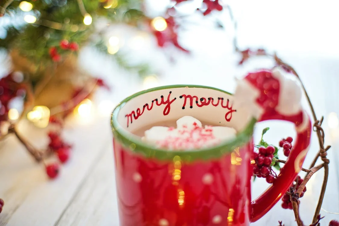 Christmas themed painted ceramic mugs as a winter crafts for adults.