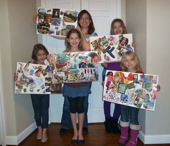 Members of the family showcases their vision board as a vision board party ideas